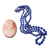 A SHELL CAMEO BROOCH AND LAPIS LAZULI NECKLACE