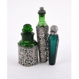 THREE SILVER MOUNTED SCENT BOTTLES