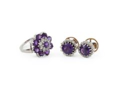 AN AMETHYST AND DIAMOND CLUSTER RING AND EARRINGS