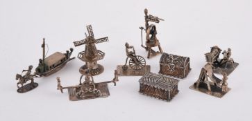 A COLLECTION OF MINIATURE SILVER MODELS
