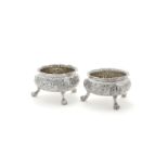 A MATCHED PAIR OF GEORGE III SILVER CAULDRON SALTS