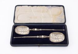 A CASED PAIR OF SILVER GILT ANOINTING SPOONS