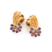 A PAIR OF MID 20TH CENTURY GOLD AND AMETHYST EAR CLIPS