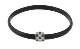 CHOPARD, A DIAMOND AND BLACK DIAMOND PANEL PENDANT ON A BLACK LEATHER COLLAR