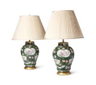 A PAIR OF YONGZHENG STYLE GROUND AND FLORAL ENAMELLED VASES FITTED AS LAMPS POSSIBLY FRENCH