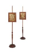A PAIR OF MAHOGANY POLE SCREENS IN REGENCY STYLE