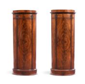 A PAIR OF DANISH MAHOGANY PEDESTAL CABINETS IN THE MANNER OF SNEDKER LAUGET COPENHAGEN