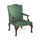 AN EARLY GEORGE III CARVED MAHOGANY ARMCHAIR ATTRIBUTED TO PAUL SAUNDERS