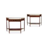 A PAIR OF DIRECTOIRE MAHOGANY, ORMOLU MOUNTED AND MARBLE TOPPED CONSOLE TABLES, CIRCA 1800