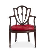 A GEORGE III MAHOGANY OPEN ARMCHAIR IN THE MANNER OF JOHN LINNELL