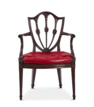 A GEORGE III MAHOGANY OPEN ARMCHAIR IN THE MANNER OF JOHN LINNELL