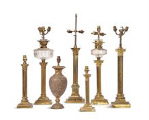 A GROUP OF SEVEN VARIOUS CORINTHIAN COLUMN TABLE LAMPS LATE 19TH CENTURY AND LATER