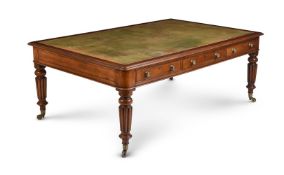 A GEORGE IV OAK LIBRARY TABLE IN THE MANNER OF GILLOW
