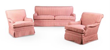 A SOFA AND ARMCHAIRS IN THE MANNER OF HOWARD & SONS