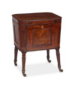 A LATE GEORGE III MAHOGANY WINE COOLER IN THE MANNER OF GILLOWS