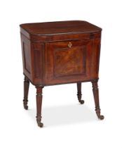 A LATE GEORGE III MAHOGANY WINE COOLER IN THE MANNER OF GILLOWS