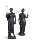 A PAIR OF EBONISED PLASTER FEMALE TORCHERE FIGURES BY HENRY HOPPER EARLY 19TH CENTURY AND LATER