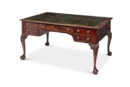 A MAHOGANY PARTNER'S DESK IN GEORGE II STYLE