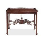 AN EDWARDIAN MAHOGANY SILVER TABLE IN GEORGE II STYLE