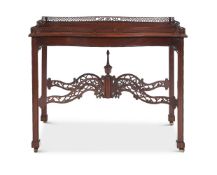 AN EDWARDIAN MAHOGANY SILVER TABLE IN GEORGE II STYLE