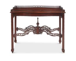 AN EDWARDIAN MAHOGANY SILVER TABLE IN GEORGE II STYLE