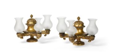 A PAIR OF REGENCY GILT BRONZE TRIPLE LIGHT COLZA TABLE LAMPS, EARLY 19TH CENTURY