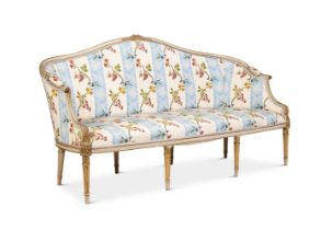 A GEORGE III CREAM PAINTED , PARCEL GILT AND UPHOLSTERED SETTEE CIRCA 1790