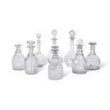 EIGHT VARIOUS DECANTERS AND SEVEN STOPPERS, VARIOUS DATES MOSTLY 19TH CENTURY