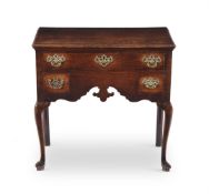 A GEORGE III OAK SIDE TABLE, CIRCA 1750