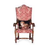 A CONTINENTAL WALNUT AND UPHOLSTERED ARMCHAIR IN 18TH CENTURY STYLE
