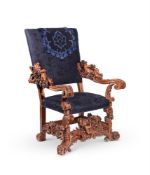 AN ITALIAN CARVED WALNUT OPEN ARMCHAIR, IN THE MANNER OF ANDREA BRUSTOLON, 19TH CENTURY