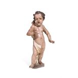 A CARVED AND POLYCHROME FIGURE OF A STANDING CHERUB, POSSIBLY GERMAN, 18TH CENTURY