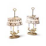 A PAIR OF GILT METAL TWIN LIGHT TABLE LIGHTS IN THE FRENCH, EARLY 19TH CENTURY
