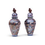 A LARGE PAIR OF SAMSON IMARI BALUSTER OCTAGONAL VASES AND COVERS, MEIJI PERIOD