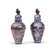 A LARGE PAIR OF SAMSON IMARI BALUSTER OCTAGONAL VASES AND COVERS, MEIJI PERIOD