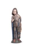 A CARVED POLYCHROME FIGURE OF A SAINT, POSSIBLY MID 16TH CENTURY