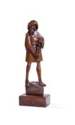 A CONTINENTAL CARVED OAK FLATBACK FIGURE OF A PEASANT OR TRAVELLER, 16TH/17TH CENTURY