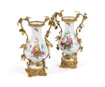 A PAIR OF BERLIN (KPM) PORCELAIN GILT-METAL MOUNTED TWO-HANDLED BALUSTER VASES, MID 19TH CENTURY