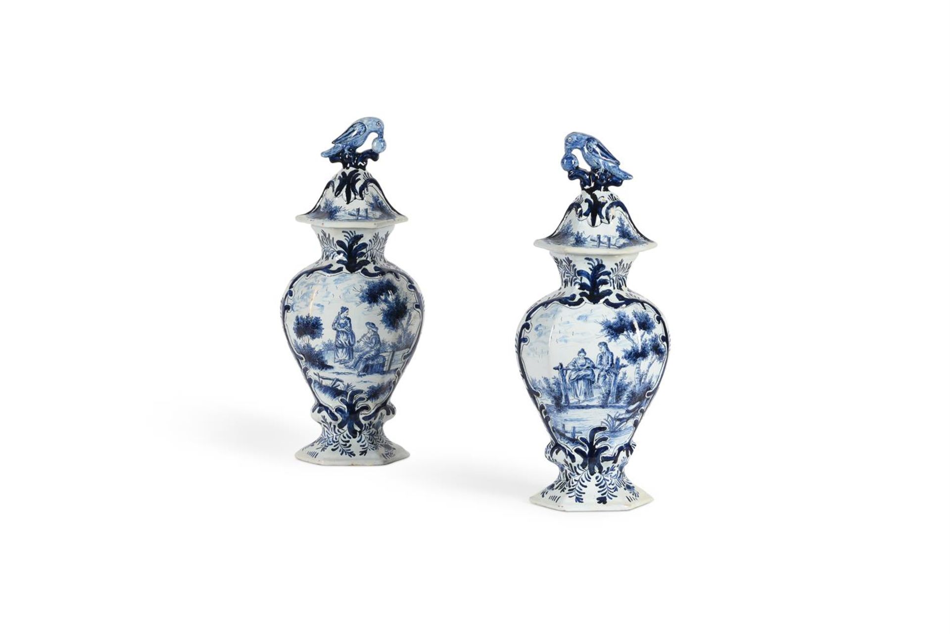A PAIR OF DUTCH DELFT BALUSTER VASES AND COVERS, CIRCA 1900