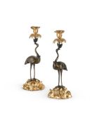 A PAIR OF BRONZE AND ORMOLU CANDLESTICKS AFTER THOMAS ABBOTT, MID 19TH CENTURY