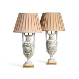 A PAIR OF POTTERY LAMP BASES IN THE MANNER OF NINETEENTH CENTURY FRENCH FAIENCE, MODERN
