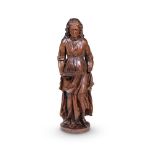 A NORTH EUROPEAN CARVED WALNUT FIGURE OF A WOMAN, LATE 17TH OR EARLY 18TH CENTURY