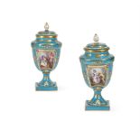 A PAIR OF SEVRES-STYLE TURQUOISE-GROUND PORCELAIN URNS AND COVERS, LATE 19TH CENTURY
