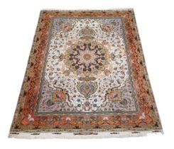 A TABRIZ SILK RUG