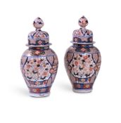 A PAIR OF JAPANESE IMARI PORCELAIN BALUSTER VASES AND COVERS, MEIJI PERIOD