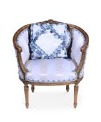 A GILTWOOD AND UPHOLSTERED TUB ARMCHAIR IN LOUIS XVI STYLE, EARLY 20TH CENTURY