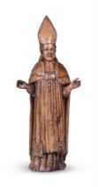 A CARVED SOFTWOOD MODEL OF A BISHOP POSSIBLY SPANISH, 19TH CENTURY