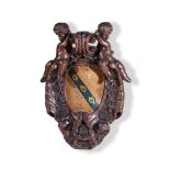 A CARVED OAK ARMORIAL PANEL IN THE BAROQUE TASTE, 19TH CENTURY