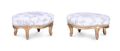 A PAIR OF GILTWOOD AND UPHOLSTERED FOOTSTOOLS, CIRCA 1900