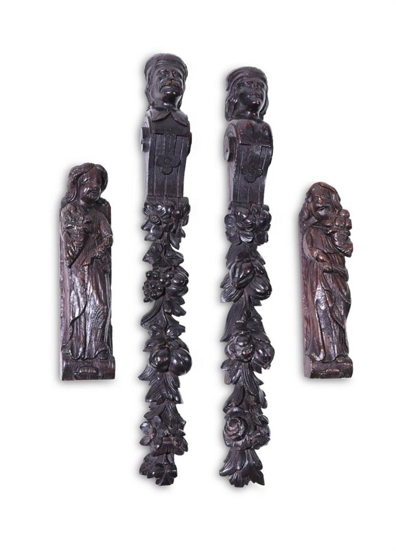 TWO PAIRS OF CARVED OAK FIGURAL MOUNTS